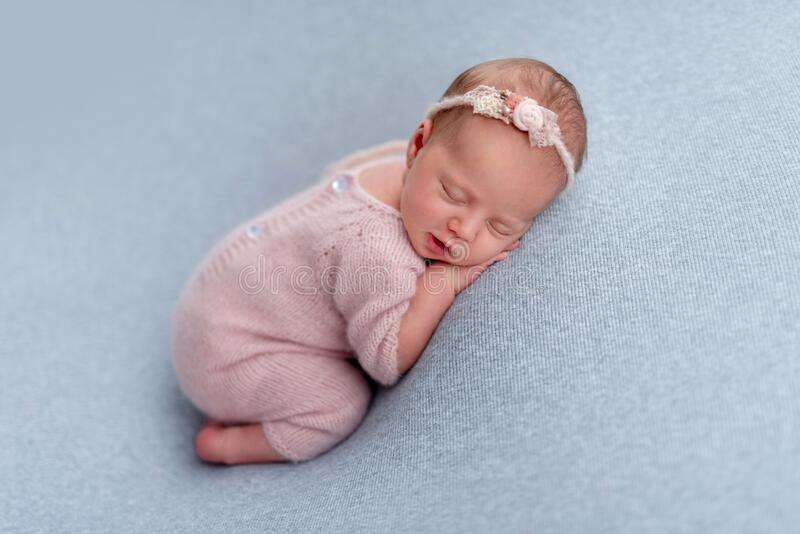 Lovely newborn on stomach stock photo. Image of asleep ...