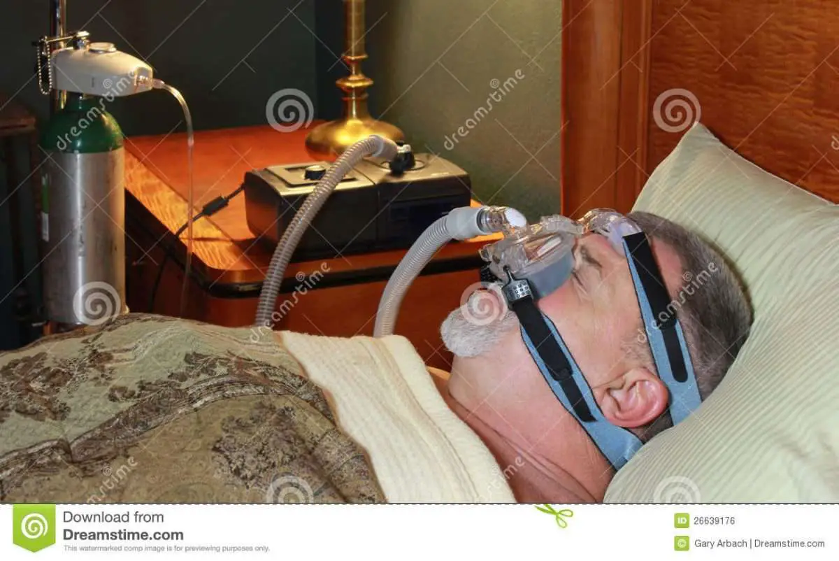 Sleeping Man (Profile) With CPAP And Oxygen Stock Photo